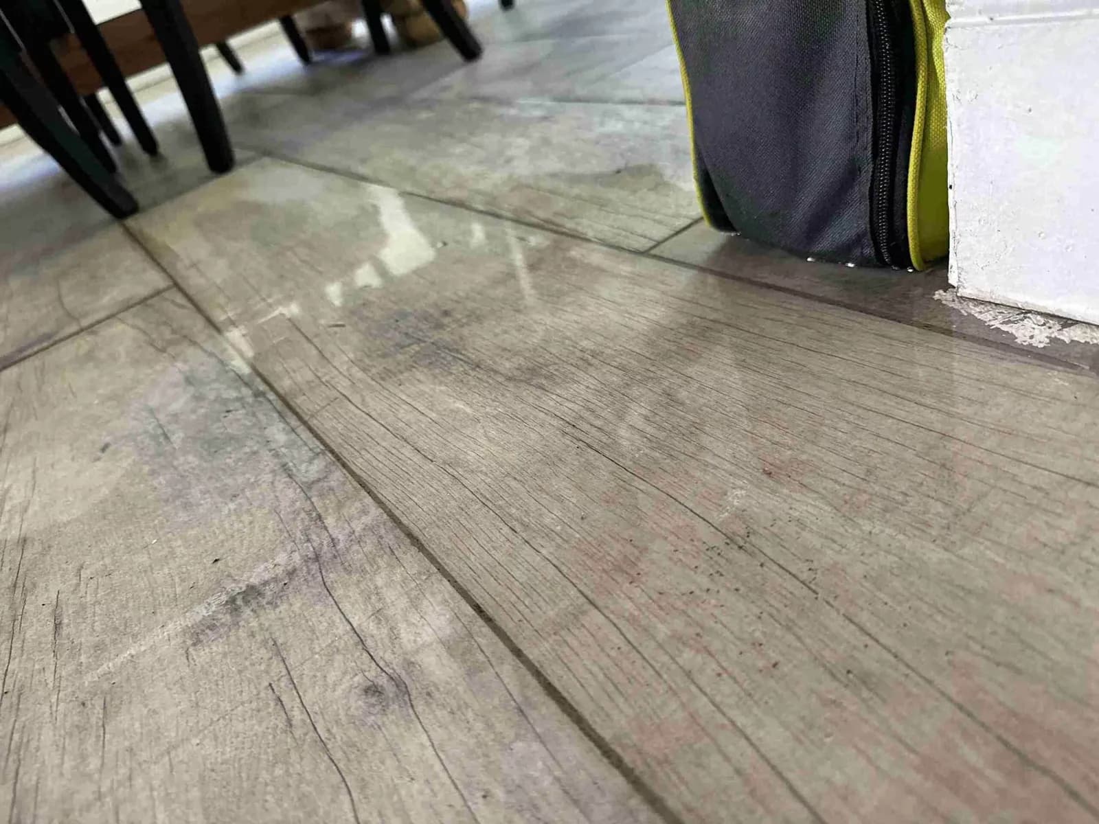 Standing water on a tile floor