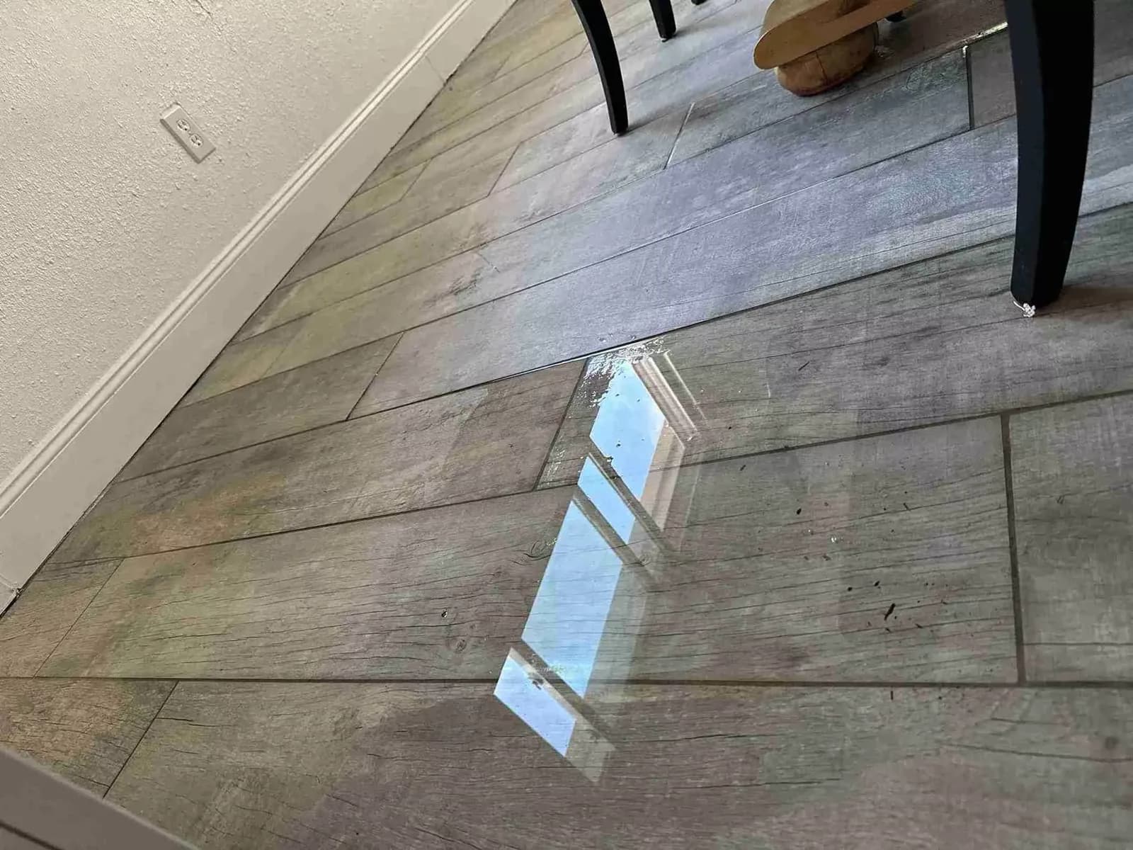 Water across a tile floor